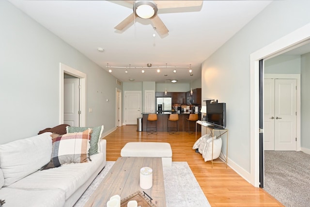 817 3rd Ave N Unit 411, Nashville, TN 37201 - living room with a ceiling fan and light wood-type flooring