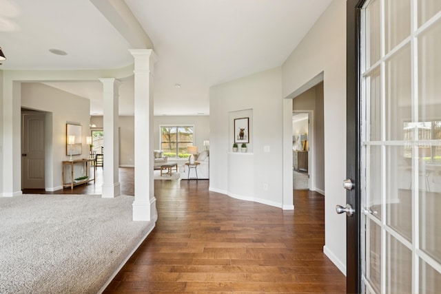 2040 Belshire Way, Spring Hill, TN 37174 - corridor featuring ornate columns, wood finished floors, and baseboards