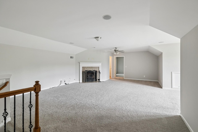 2040 Belshire Way, Spring Hill, TN 37174 - unfurnished living room featuring carpet, a ceiling fan, baseboards, a fireplace, and lofted ceiling