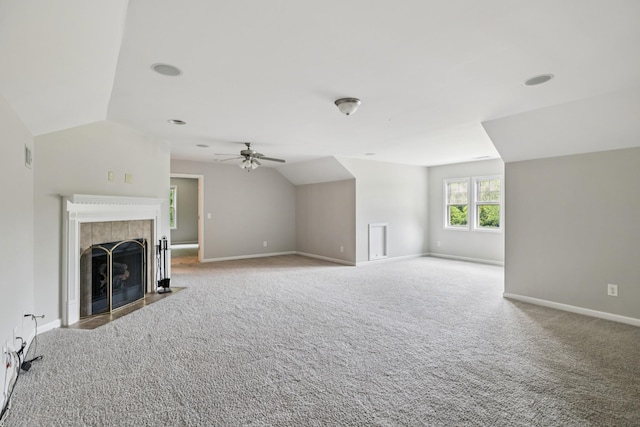 2040 Belshire Way, Spring Hill, TN 37174 - unfurnished living room featuring lofted ceiling, ceiling fan, carpet flooring, baseboards, and a fireplace