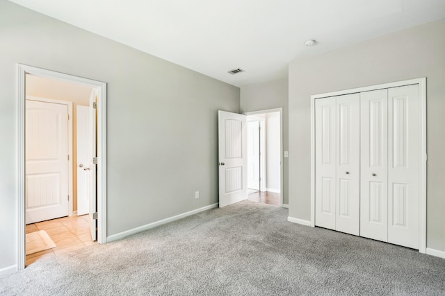 2040 Belshire Way, Spring Hill, TN 37174 - unfurnished bedroom featuring carpet floors, baseboards, and a closet