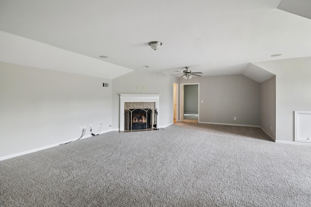 2040 Belshire Way, Spring Hill, TN 37174 - unfurnished living room featuring lofted ceiling, carpet floors, a ceiling fan, baseboards, and a tiled fireplace