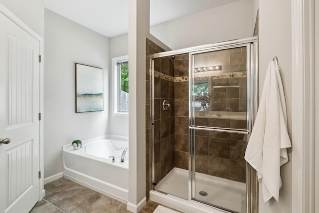 2040 Belshire Way, Spring Hill, TN 37174 - bathroom with a bath, a shower stall, and baseboards