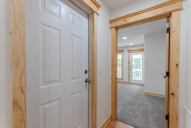 619 Bridgeview Cv, Bath Springs, TN 38311 - foyer featuring light colored carpet, baseboards, and recessed lighting