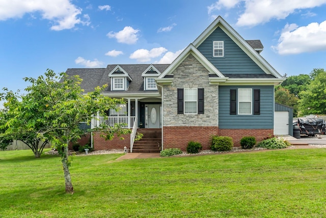 1305 Standing Stone Cir, Columbia, TN 38401 - view of front of home with a front yard, a porch, stone siding, and stairs