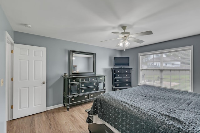 1305 Standing Stone Cir, Columbia, TN 38401 - bedroom with wood finished floors, baseboards, and ceiling fan