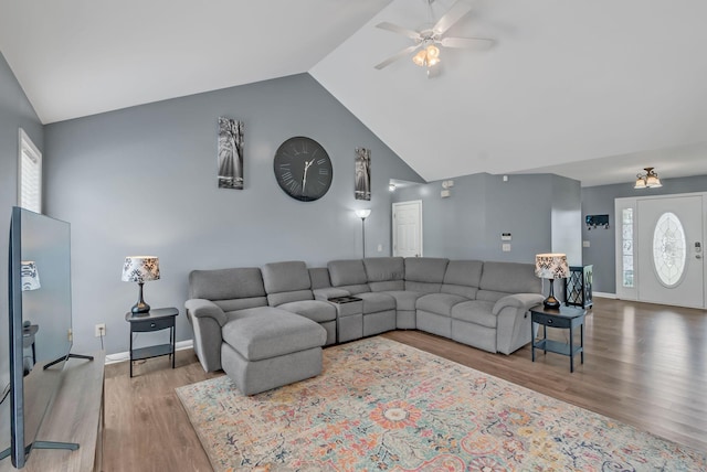 1305 Standing Stone Cir, Columbia, TN 38401 - living room with lofted ceiling, ceiling fan, wood finished floors, and baseboards