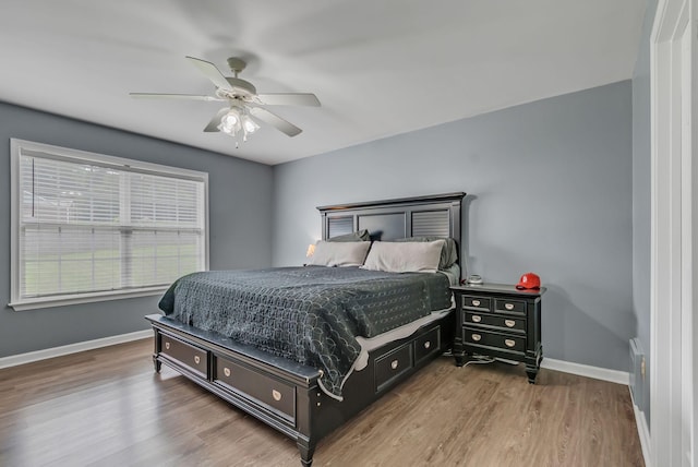 1305 Standing Stone Cir, Columbia, TN 38401 - bedroom featuring wood finished floors, baseboards, and a ceiling fan