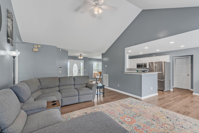 1305 Standing Stone Cir, Columbia, TN 38401 - living room with ceiling fan, light wood-style floors, high vaulted ceiling, baseboards, and recessed lighting