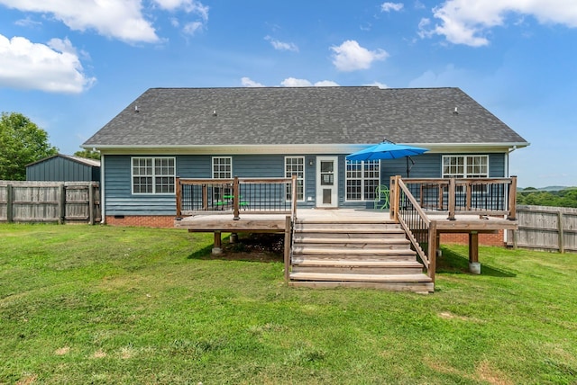 1305 Standing Stone Cir, Columbia, TN 38401 - rear view of house with a shingled roof and a wooden deck