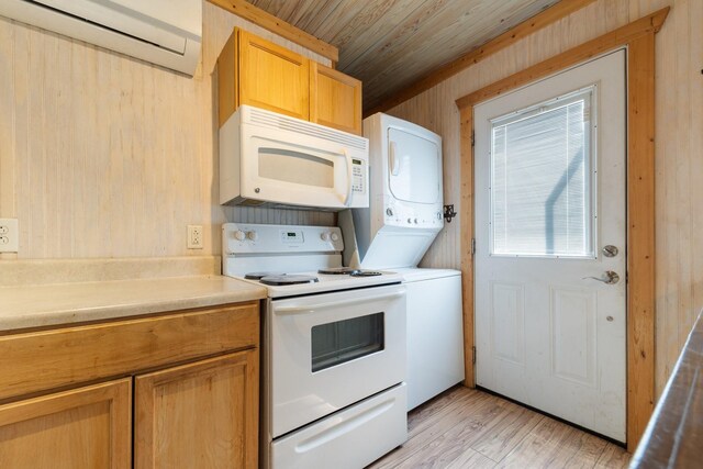 5312 Wiley Hollow Rd, Culleoka, TN 38451 - kitchen featuring white appliances, stacked washer / dryer, wooden ceiling, light wood-type flooring, and light countertops