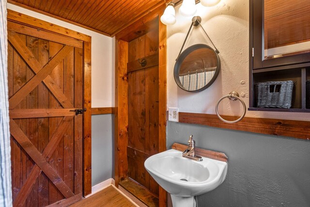 5312 Wiley Hollow Rd, Culleoka, TN 38451 - bathroom featuring a sink, wood finished floors, and wood ceiling