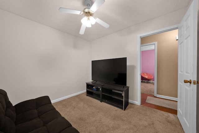 2879 Chinquapin Ln, Clarksville, TN 37043 - living area featuring carpet floors, a ceiling fan, and baseboards