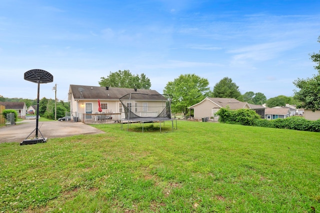 2879 Chinquapin Ln, Clarksville, TN 37043 - view of grassy yard featuring a trampoline and a patio area