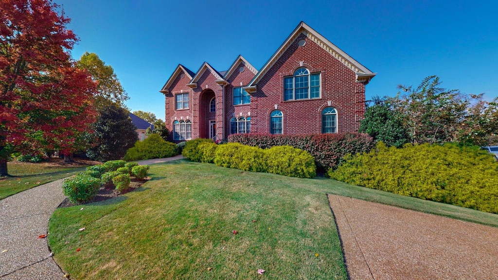 1236 Monarch Way, Brentwood, TN 37027 - colonial house featuring a front lawn and brick siding