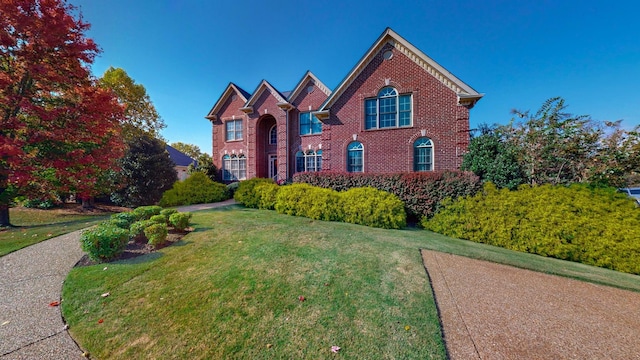 1236 Monarch Way, Brentwood, TN 37027 - colonial house featuring a front lawn and brick siding