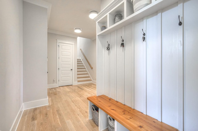 2117 Southern Preserve Ln, Franklin, TN 37064 - mudroom with light wood-style floors and ornamental molding