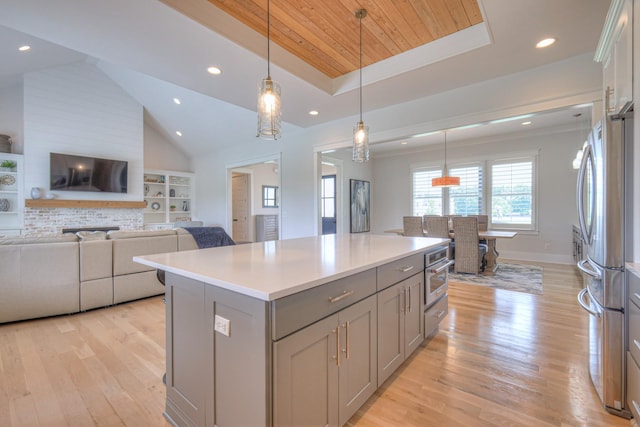 2117 Southern Preserve Ln, Franklin, TN 37064 - kitchen featuring stainless steel appliances, gray cabinetry, a center island, light wood finished floors, and recessed lighting