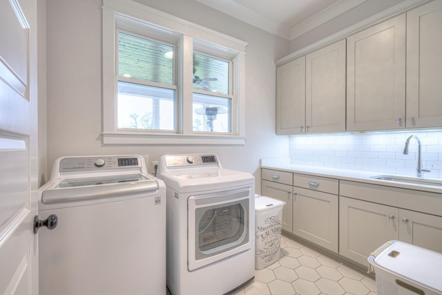 2117 Southern Preserve Ln, Franklin, TN 37064 - laundry area featuring washer and dryer, cabinet space, and light tile patterned flooring