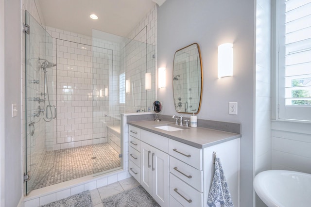 2117 Southern Preserve Ln, Franklin, TN 37064 - full bathroom with a shower stall, vanity, a freestanding bath, marble finish floors, and recessed lighting