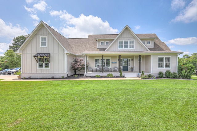 2117 Southern Preserve Ln, Franklin, TN 37064 - view of front of home featuring board and batten siding, a porch, roof with shingles, and a front yard