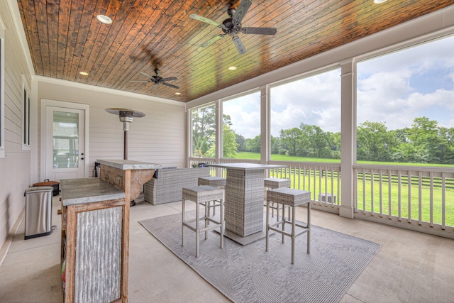 2117 Southern Preserve Ln, Franklin, TN 37064 - sunroom with ceiling fan, wooden ceiling, view of wooded area, and recessed lighting