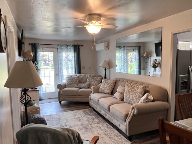 4250 Standing Rock Rd, Jamestown, TN 38556 - living room with an AC wall unit, plenty of natural light, wood finished floors, and ceiling fan