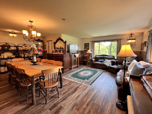 4250 Standing Rock Rd, Jamestown, TN 38556 - dining room with a textured ceiling, wood finished floors, and a chandelier