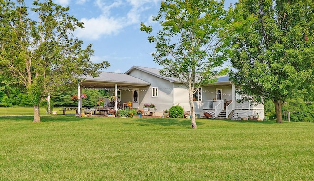 4250 Standing Rock Rd, Jamestown, TN 38556 - rear view of property with a yard and covered porch