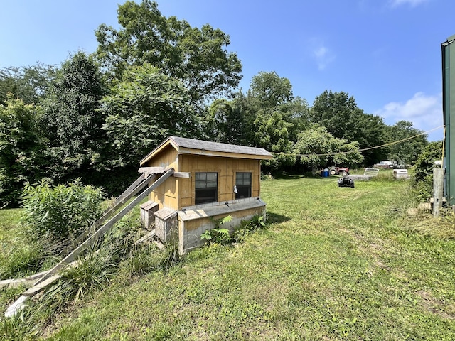 4250 Standing Rock Rd, Jamestown, TN 38556 - view of grassy yard featuring an outbuilding