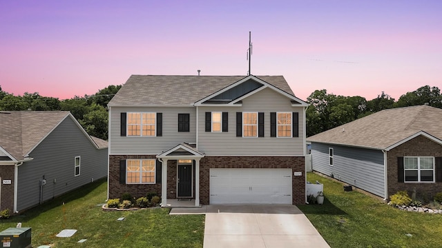 5073 Hunters Village Dr, Lebanon, TN 37087 - traditional-style house featuring brick siding, driveway, a front yard, and an attached garage
