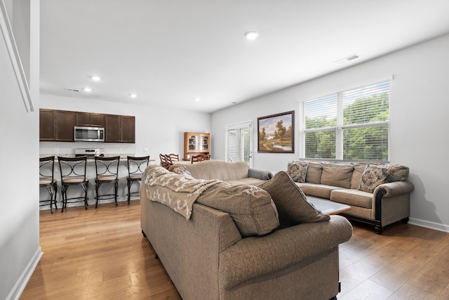 5073 Hunters Village Dr, Lebanon, TN 37087 - living area featuring light wood-type flooring and recessed lighting