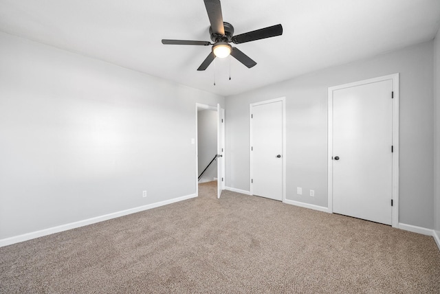 361 Peabody Dr, Clarksville, TN 37042 - unfurnished bedroom featuring carpet floors, multiple closets, and ceiling fan