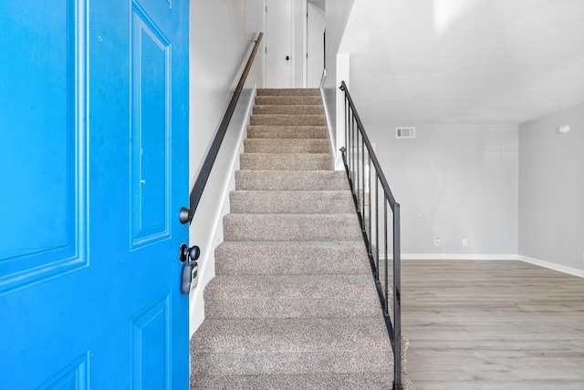 361 Peabody Dr, Clarksville, TN 37042 - stairs featuring wood finished floors and baseboards