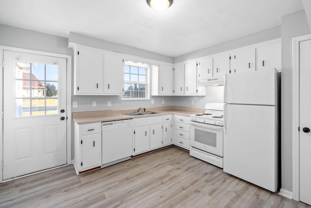 361 Peabody Dr, Clarksville, TN 37042 - kitchen with white appliances, under cabinet range hood, light wood finished floors, white cabinetry, and light countertops