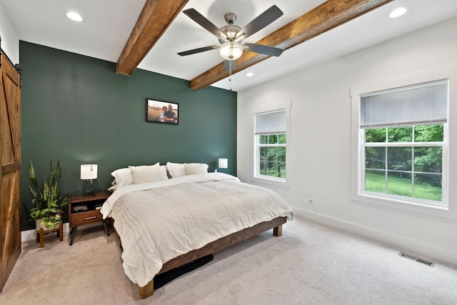3650 Riggins Rd, Cumberland Furnace, TN 37051 - bedroom with light colored carpet, a barn door, recessed lighting, baseboards, and beamed ceiling