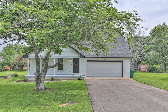 1713 Hollow Oak Dr, Lebanon, TN 37087 - view of front facade featuring a porch, driveway, an attached garage, and a shingled roof
