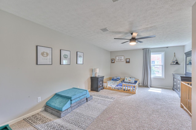 1713 Hollow Oak Dr, Lebanon, TN 37087 - sitting room with ceiling fan, carpet, a textured ceiling, and baseboards