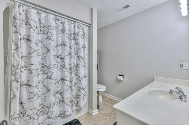 1713 Hollow Oak Dr, Lebanon, TN 37087 - full bath with vanity, toilet, a textured ceiling, and tile patterned floors