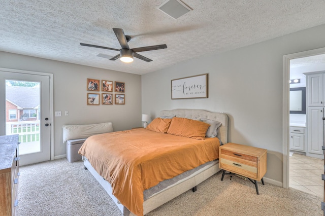 1713 Hollow Oak Dr, Lebanon, TN 37087 - bedroom with access to exterior, light carpet, a textured ceiling, ensuite bathroom, and a ceiling fan