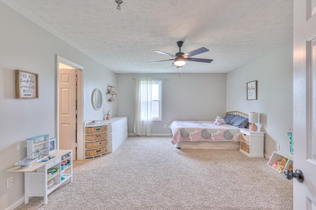 1713 Hollow Oak Dr, Lebanon, TN 37087 - bedroom with light carpet, a textured ceiling, a ceiling fan, and baseboards