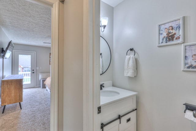 1713 Hollow Oak Dr, Lebanon, TN 37087 - bathroom featuring vanity, a textured ceiling, and ensuite bathroom