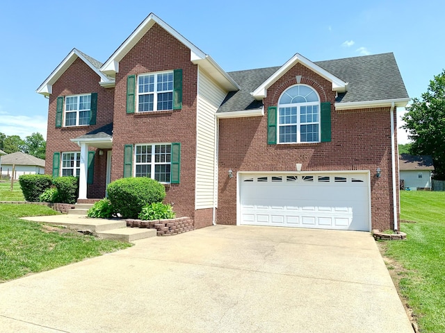 1635 Barrywood Cir E, Clarksville, TN 37042 - traditional-style home with concrete driveway, a garage, brick siding, a front yard, and a shingled roof