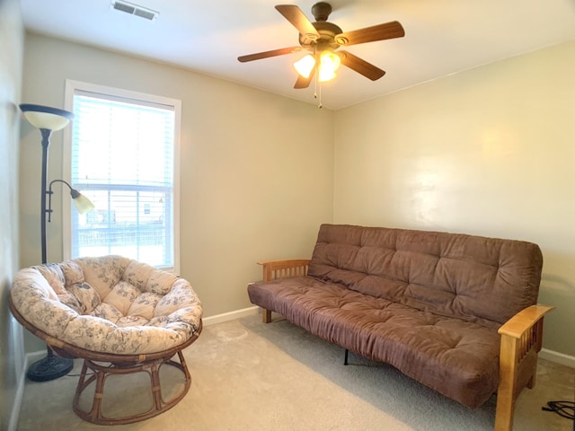 1635 Barrywood Cir E, Clarksville, TN 37042 - living area with light carpet, healthy amount of natural light, baseboards, and a ceiling fan