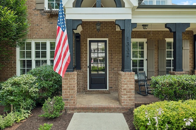 1332 Jewell Ave, Franklin, TN 37064 - doorway to property featuring brick siding and covered porch