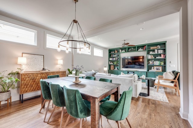 134 Fitzgerald St, Franklin, TN 37064 - dining area with ornamental molding, light wood-type flooring, a ceiling fan, built in features, and baseboards
