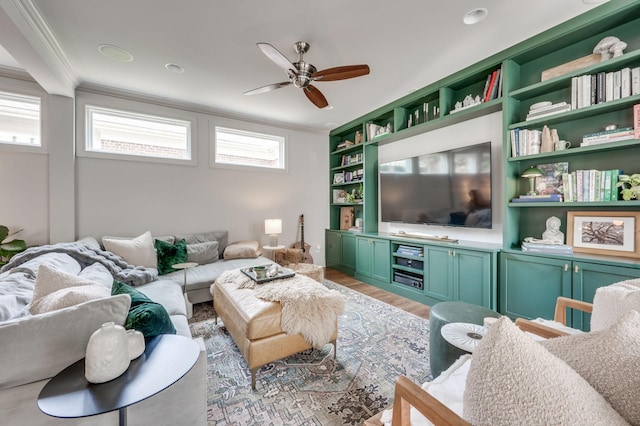 134 Fitzgerald St, Franklin, TN 37064 - living area with crown molding, a ceiling fan, light wood-style flooring, and built in shelves