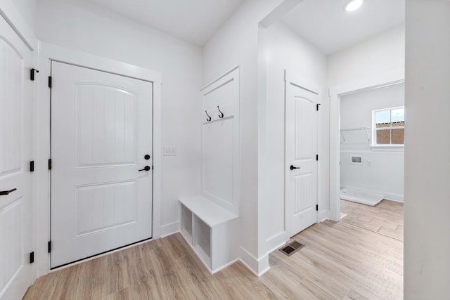338 Dugout Rd, Summertown, TN 38483 - mudroom featuring light wood-style floors and baseboards