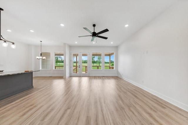 338 Dugout Rd, Summertown, TN 38483 - unfurnished living room featuring baseboards, a chandelier, recessed lighting, and light wood finished floors