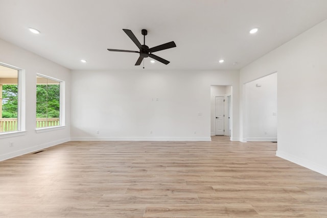 338 Dugout Rd, Summertown, TN 38483 - spare room featuring light wood-style flooring, recessed lighting, a ceiling fan, and baseboards